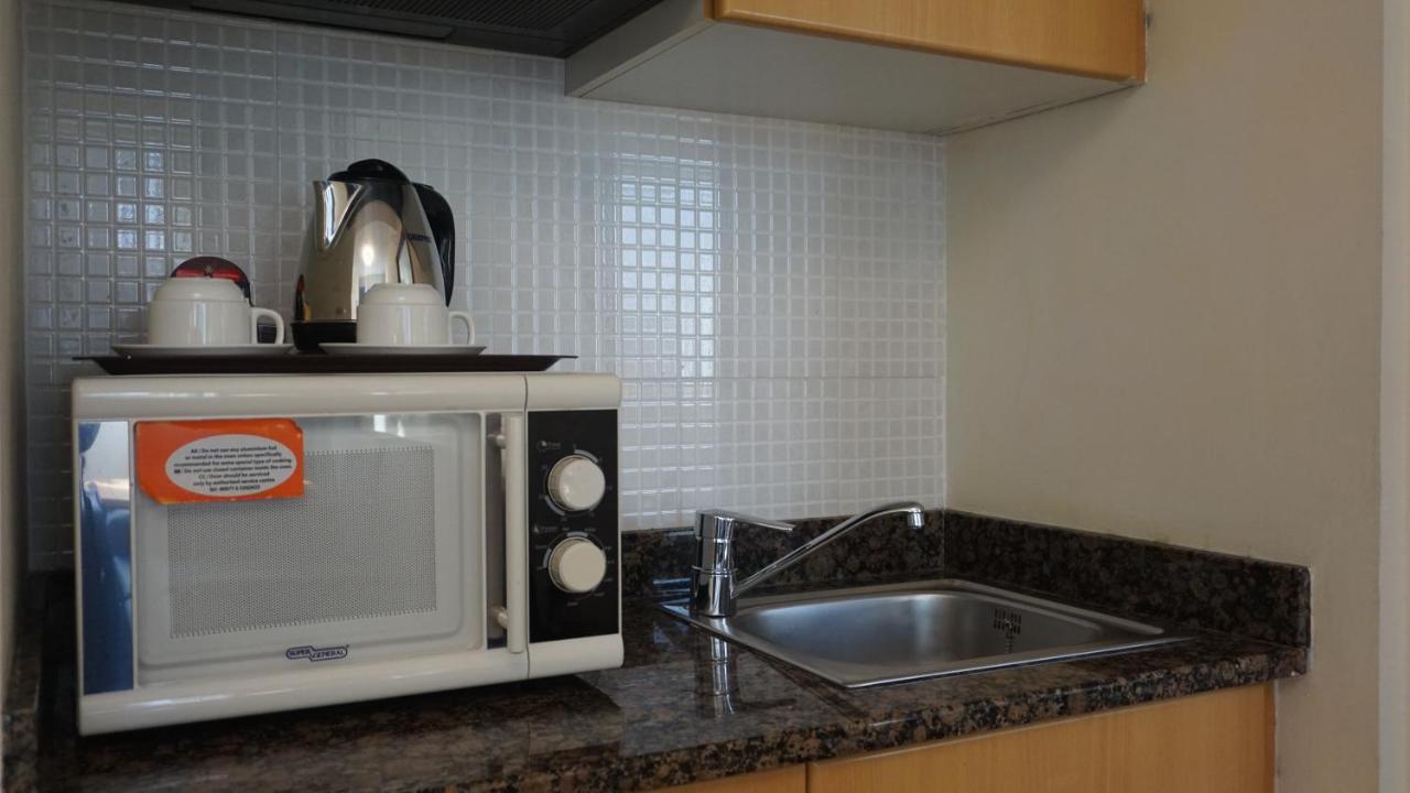 Golden Tulip Sharjah Aparthotel Εξωτερικό φωτογραφία