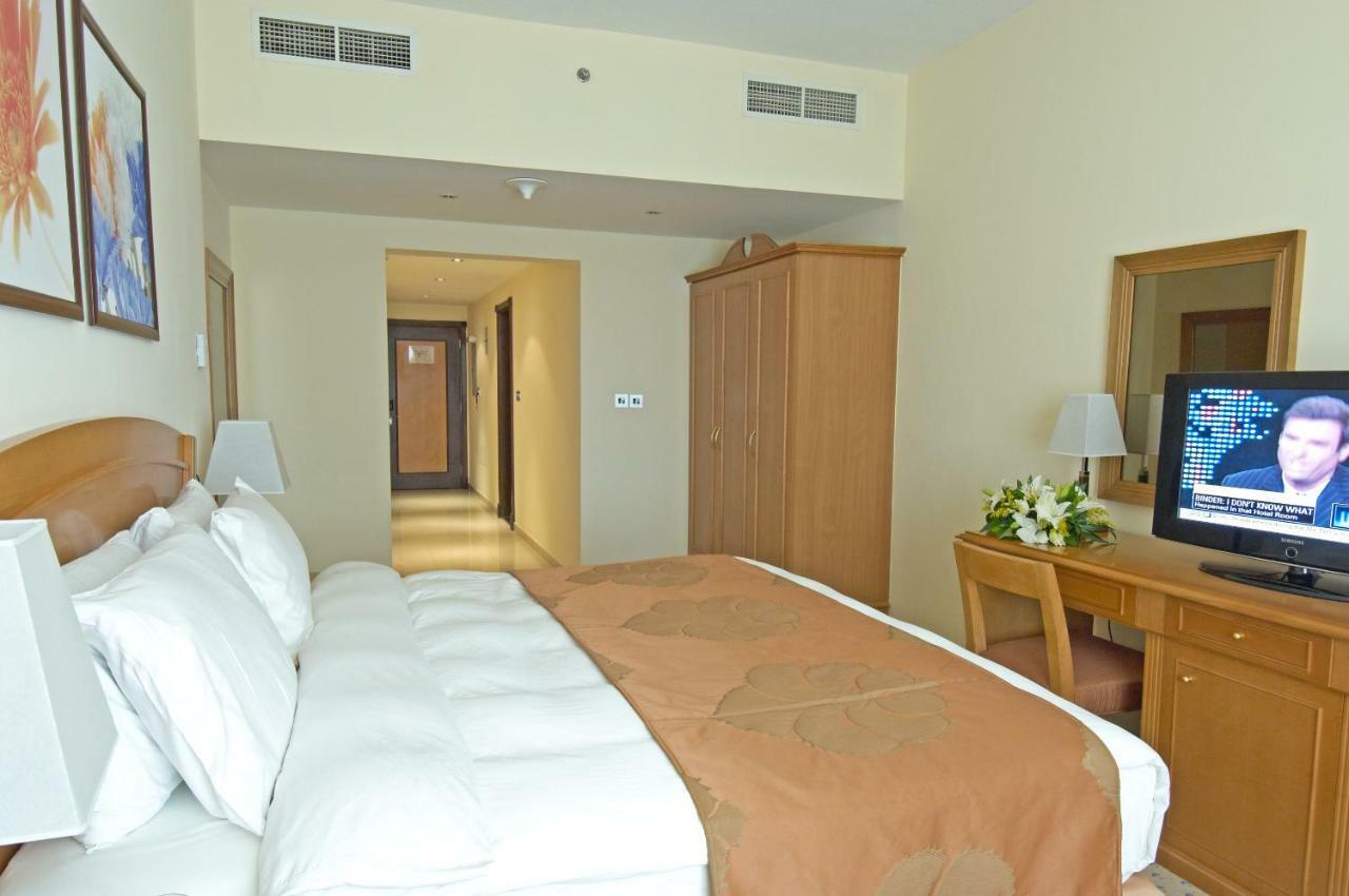 Golden Tulip Sharjah Aparthotel Εξωτερικό φωτογραφία