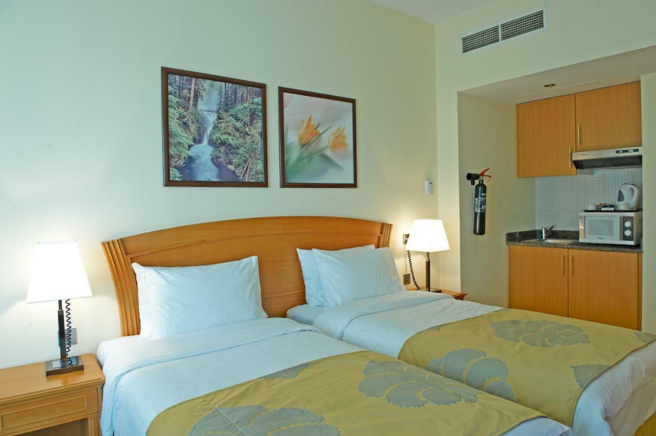 Golden Tulip Sharjah Aparthotel Εξωτερικό φωτογραφία